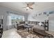 Comfortable living room with plush sectional sofa and bright natural light at 4306 Bayside Village Dr # 201, Tampa, FL 33615