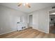 The light-filled bedroom offers a ceiling fan and neutral wall paint to match any decor styles at 4325 Aegean Dr # 250B, Tampa, FL 33611