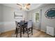Inviting dining room with table, chairs, fan and nice floors creating a comfortable and stylish space at 4325 Aegean Dr # 250B, Tampa, FL 33611