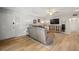 Spacious living area with hardwood floors, a comfortable sofa, and stylish decor, perfect for relaxing at 4325 Aegean Dr # 250B, Tampa, FL 33611