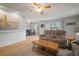 The living space connects the dining area, highlighting a comfortable sofa arrangement and stylish decor at 4325 Aegean Dr # 250B, Tampa, FL 33611