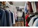 Walk-in closet includes shelving for storage and hanging racks for organization at 4325 Aegean Dr # 250B, Tampa, FL 33611