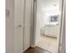 Well-lit bathroom featuring neutral tile flooring and a white vanity offering a soothing retreat at 4411 Shady Terrace Ln # 213, Tampa, FL 33613