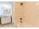 Bathroom features a vanity with drawers, toilet and a shower/tub with marble tile at 4411 Shady Terrace Ln # 213, Tampa, FL 33613