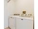 Bright laundry room featuring a white Maytag washer and dryer set at 4411 Shady Terrace Ln # 213, Tampa, FL 33613