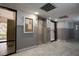 Well-lit lobby with elevators and community bulletin board at 4411 Shady Terrace Ln # 213, Tampa, FL 33613