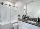 Bathroom with white subway tile in shower and granite counters on vanity at 4567 Tuscan Loon Dr, Tampa, FL 33619