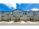 A row of lovely townhomes boasting well-manicured landscaping and multiple car garages at 4567 Tuscan Loon Dr, Tampa, FL 33619