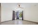 Bright, airy bedroom features large windows with elegant curtains at 5002 E Longboat Blvd, Tampa, FL 33615