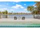 Dockside view with lounge chairs, providing an idyllic waterfront setting at 5002 E Longboat Blvd, Tampa, FL 33615
