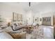 Comfortable living room showcasing neutral furniture, modern decor, and lots of natural light at 5002 E Longboat Blvd, Tampa, FL 33615