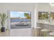 Open living space with seamless indoor-outdoor flow to the pool and waterfront at 5002 E Longboat Blvd, Tampa, FL 33615