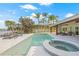 Relaxing pool area features a spa and comfortable seating, offering scenic water views at 5002 E Longboat Blvd, Tampa, FL 33615