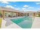Stunning pool and outdoor living area overlooking the waterfront at 5002 E Longboat Blvd, Tampa, FL 33615