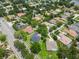 An overhead view features this property with lush landscaping and beautiful curb appeal at 505 Vintage Way, Brandon, FL 33511