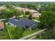 A property showcases a sparkling pool enclosed in a screened-in patio at 505 Vintage Way, Brandon, FL 33511