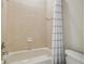 Bathroom with a bathtub, tiled walls and a shower curtain at 505 Vintage Way, Brandon, FL 33511