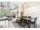 Open-concept design combines dining and living spaces with modern finishes and bright lighting at 505 Vintage Way, Brandon, FL 33511