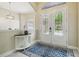 Elegant foyer features double front doors and stylish accents, creating a welcoming entrance at 505 Vintage Way, Brandon, FL 33511