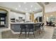 Bright kitchen featuring a center island, white cabinetry, stainless steel appliances, and an open layout at 505 Vintage Way, Brandon, FL 33511