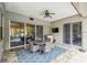 View of patio with a dining table and sliding glass doors at 505 Vintage Way, Brandon, FL 33511