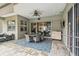 Patio featuring a dining table, tile floor, and sliding doors at 505 Vintage Way, Brandon, FL 33511
