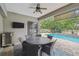 Covered patio with seating area and view of pool at 505 Vintage Way, Brandon, FL 33511