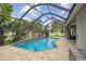Sparkling pool with screened enclosure offers privacy and a relaxing outdoor experience at 505 Vintage Way, Brandon, FL 33511