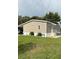 Well maintained single-story home with a carport and easy to maintain landscaping at 5105 Wood St, Zephyrhills, FL 33542