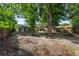 The home's backyard has brick patio under a gazebo and a sunroom attached to the house at 5210 Dr Martin Luther King Jr St N St, St Petersburg, FL 33703