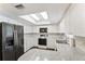 Modern kitchen featuring stainless steel appliances, sleek countertops, and ample cabinet space, perfect for cooking enthusiasts at 5210 Dr Martin Luther King Jr St N St, St Petersburg, FL 33703
