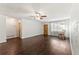 Open-concept living room boasting hardwood floors, natural light, and a ceiling fan, creating a welcoming atmosphere at 5210 Dr Martin Luther King Jr St N St, St Petersburg, FL 33703