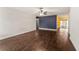 Spacious living room featuring hardwood floors and neutral-toned walls, creating a blank canvas for personalization at 5210 Dr Martin Luther King Jr St N St, St Petersburg, FL 33703