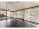 Bright sunroom with tile flooring and backyard access at 5210 Dr Martin Luther King Jr St N St, St Petersburg, FL 33703