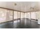 Bright sunroom featuring tile flooring, natural light, and views of the backyard at 5210 Dr Martin Luther King Jr St N St, St Petersburg, FL 33703