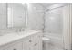 Bright and clean bathroom featuring white marble walls and modern fixtures at 5528 Liberty Plain Cir, Tampa, FL 33611