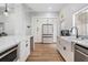 Contemporary kitchen featuring modern appliances, ample storage space, and light countertops at 5528 Liberty Plain Cir, Tampa, FL 33611
