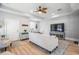 Cozy living room showcasing wood floors, stylish decor, and an inviting atmosphere at 5528 Liberty Plain Cir, Tampa, FL 33611