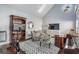 Cozy living room with vaulted ceilings, skylights, and a variety of furniture and decor at 5528 Liberty Plain Cir, Tampa, FL 33611