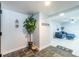 Welcoming foyer with slate tile, a decorative plant, and an open view of the interior at 5625 Atlantic N Ave, St Petersburg, FL 33703