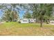 Charming single-story home with a well-maintained lawn and mature trees at 5625 Atlantic N Ave, St Petersburg, FL 33703