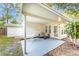 Covered patio with outdoor seating, perfect for relaxing and entertaining at 5625 Atlantic N Ave, St Petersburg, FL 33703