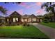 Charming single-story home with a well-manicured lawn, mature landscaping, and inviting curb appeal at 5823 Terncrest Dr, Lithia, FL 33547