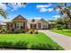 Charming single-story home with a well-manicured lawn, mature landscaping, and inviting curb appeal at 5823 Terncrest Dr, Lithia, FL 33547