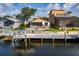 Lovely waterfront home has a private dock and patio, offering serene outdoor living and boating opportunities at 6340 Garland Ct, New Port Richey, FL 34652