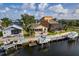 The waterfront home offers outdoor living with a patio and boat dock perfect for enjoying coastal life at 6340 Garland Ct, New Port Richey, FL 34652
