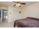Cozy bedroom featuring a closet and tile flooring at 6340 Garland Ct, New Port Richey, FL 34652