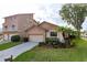 Charming single-Gathering home featuring a well-maintained lawn and an attached two-car garage at 6340 Garland Ct, New Port Richey, FL 34652