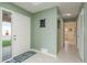 Inviting foyer with tile flooring leads to the rest of the home at 6340 Garland Ct, New Port Richey, FL 34652