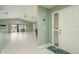 Bright and airy living room with tile floors and views of the outdoor area at 6340 Garland Ct, New Port Richey, FL 34652